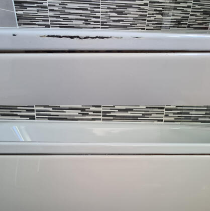 before and after photos of a steel bath rust repair in Southampton