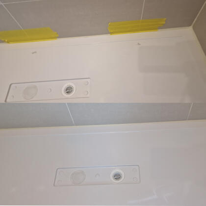 before and after photos of a shower tray chip repair in Southampton